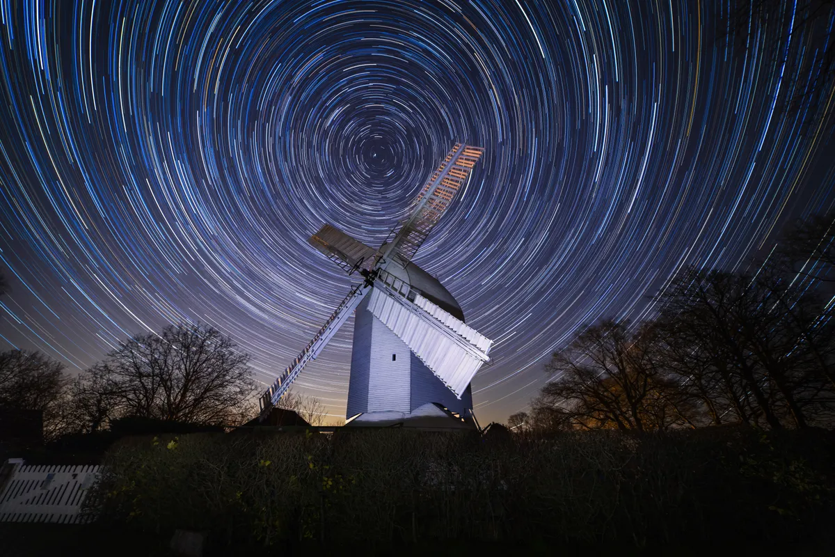 Star trails circling above Oldlands Windmill in Hassocks under a clear winter night sky