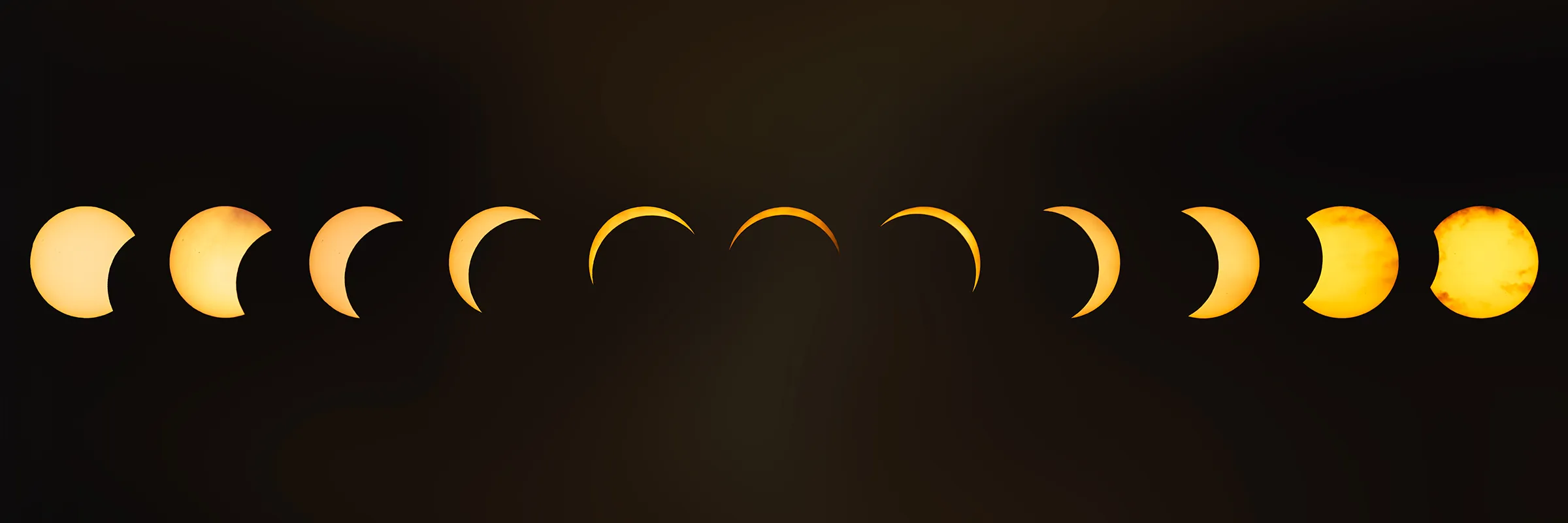 Sequence of the Moon passing across the Sun during the August 2026 solar eclipse, photographed from Talacre Beach in North Wales